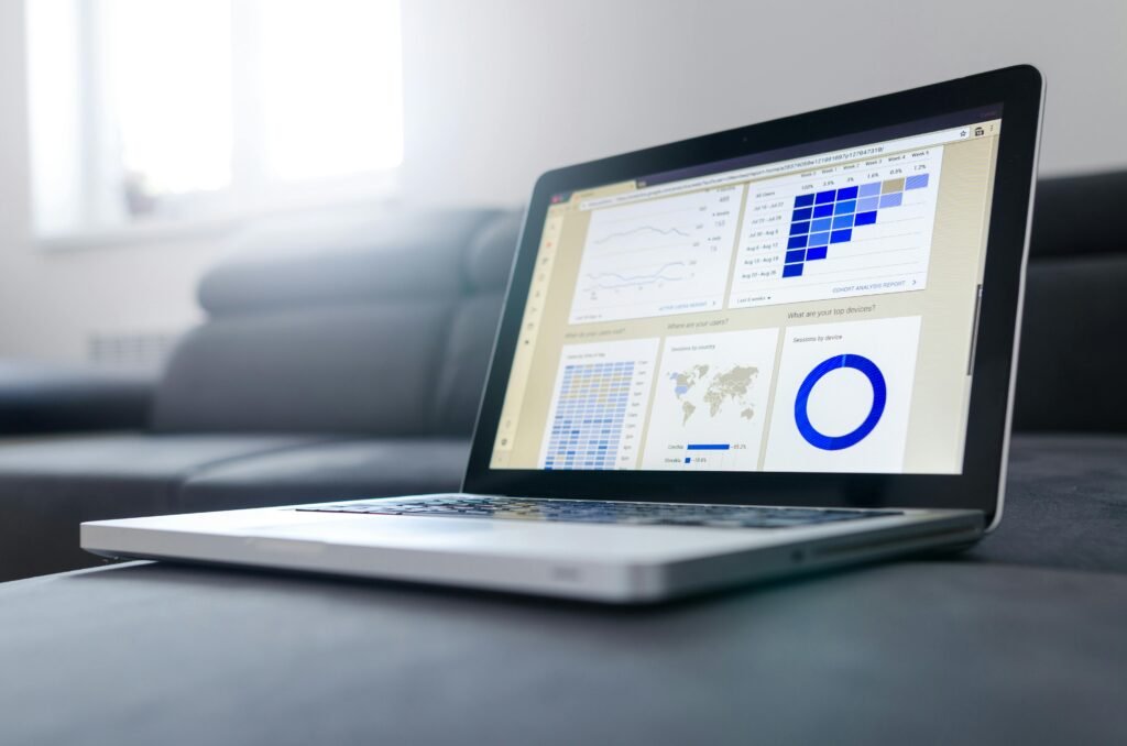 Laptop showing website performance and search ranking charts
